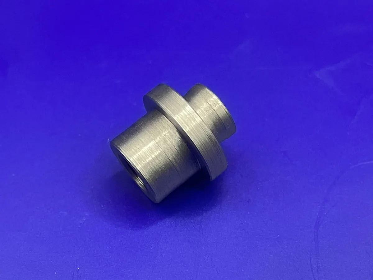 CNC turned part with collar